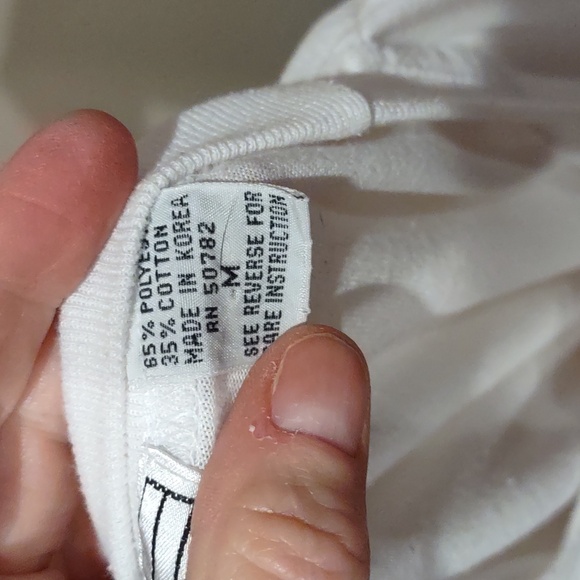 Classic White T-Shirt With Front Pocket And Crochet Bow Trim - Picture 4 of 6